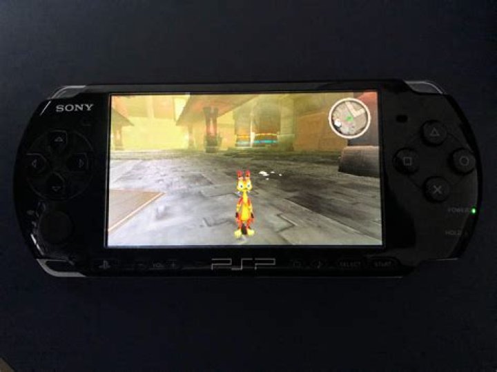How do I put games on my PSP 3000?