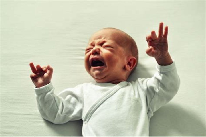 How do you settle an overtired baby screaming?