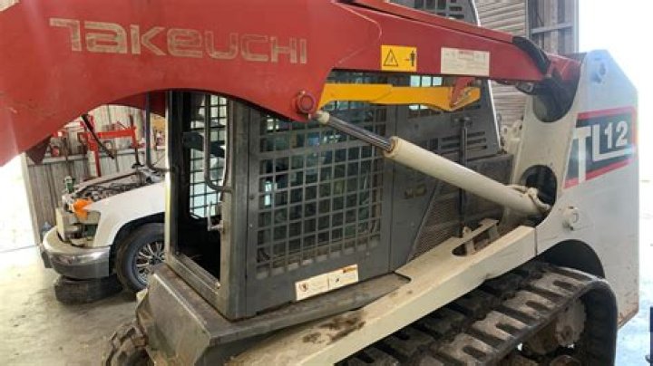 What engine is in a Takeuchi TL12?