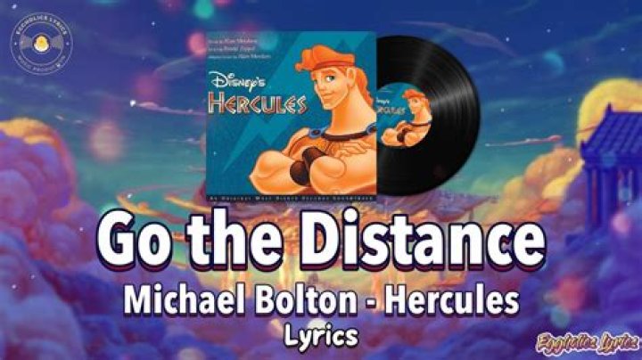 Who wrote the song Go the Distance?